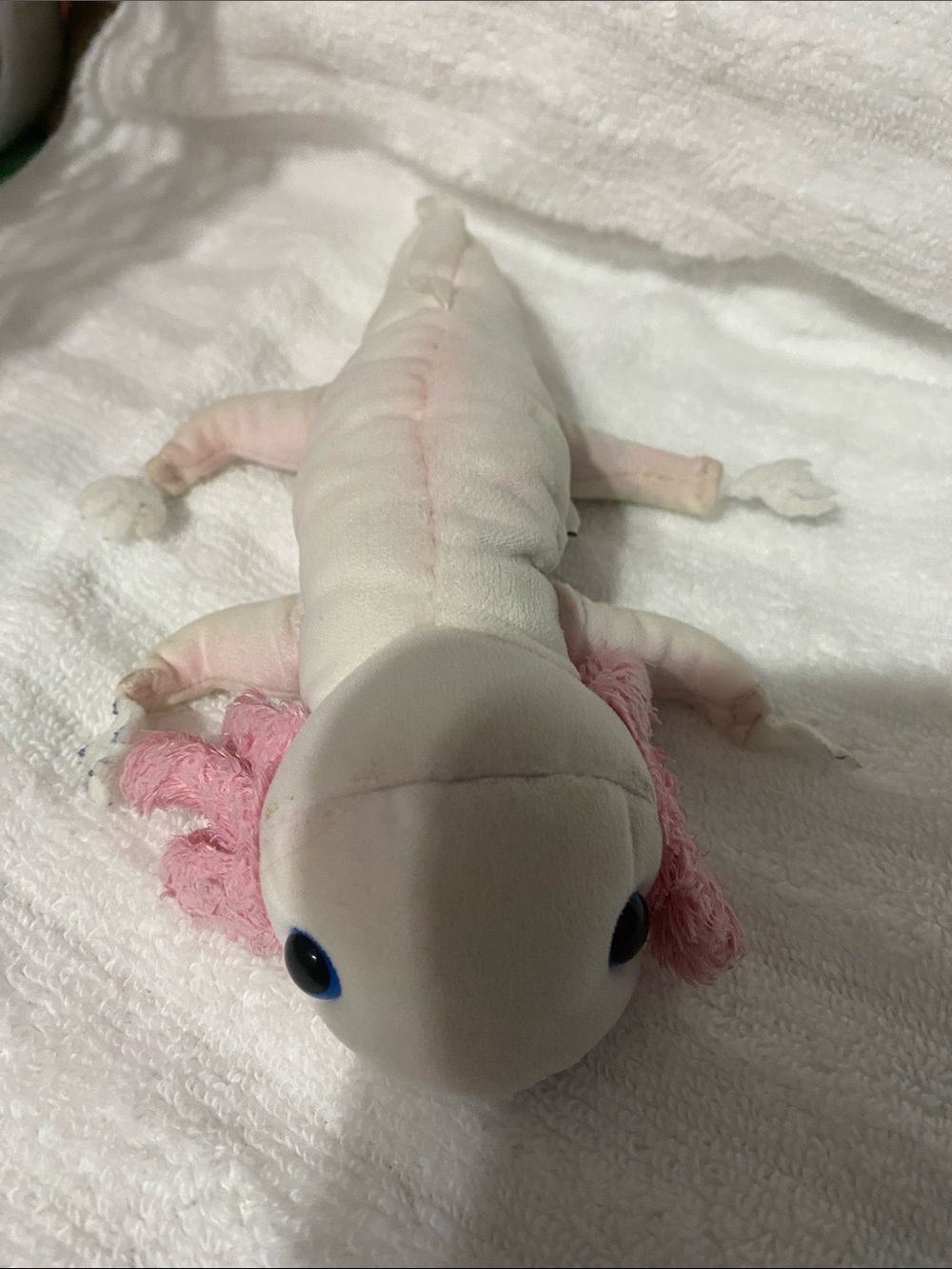 This is a Folkmanis Axolotl Finger Puppet